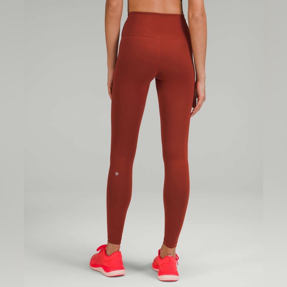Wunder Train HR Tight 25" *Pockets CYNN in size 4 NWT